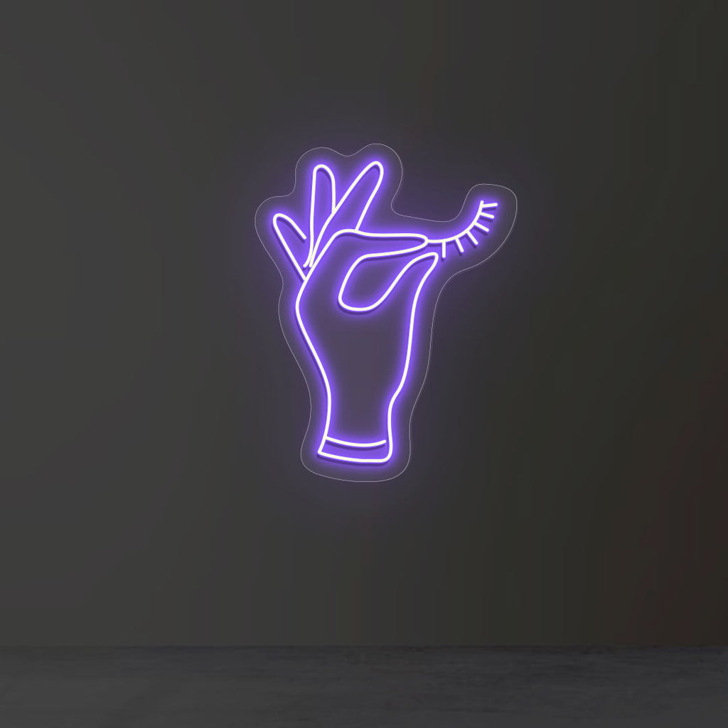 Hand Holding Eyelash Neon Sign