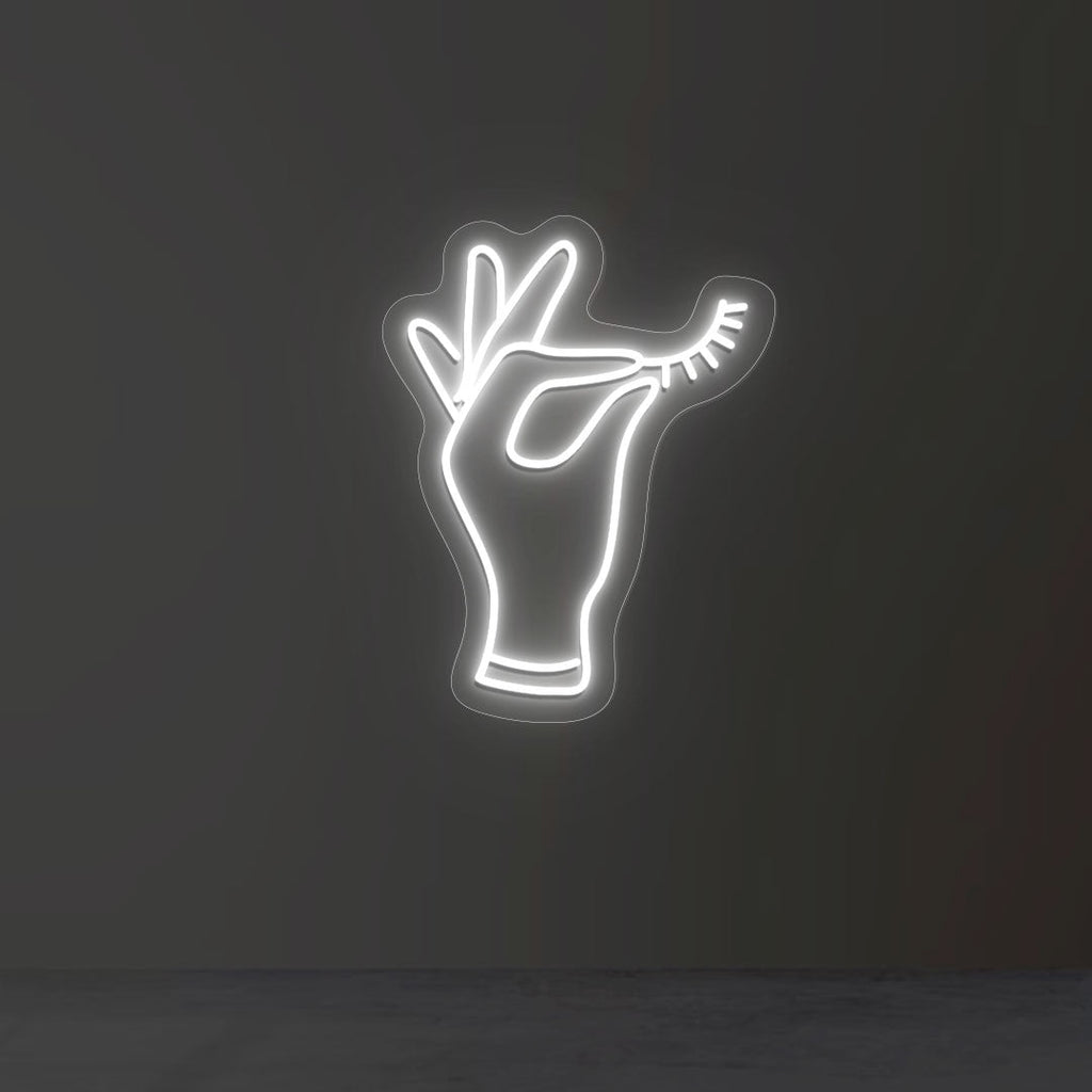 Hand Holding Eyelash Neon Sign