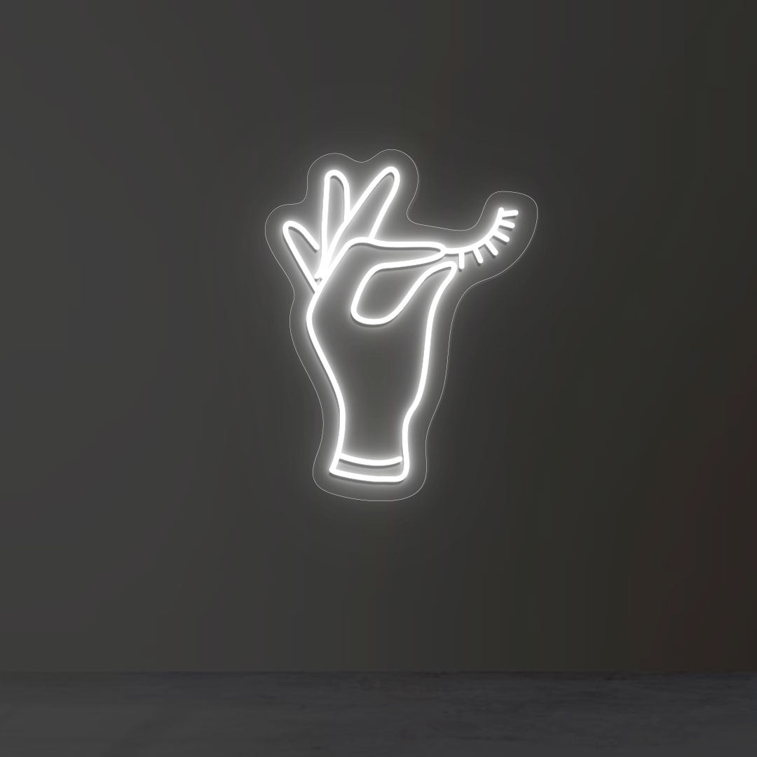 Hand Holding Eyelash Neon Sign