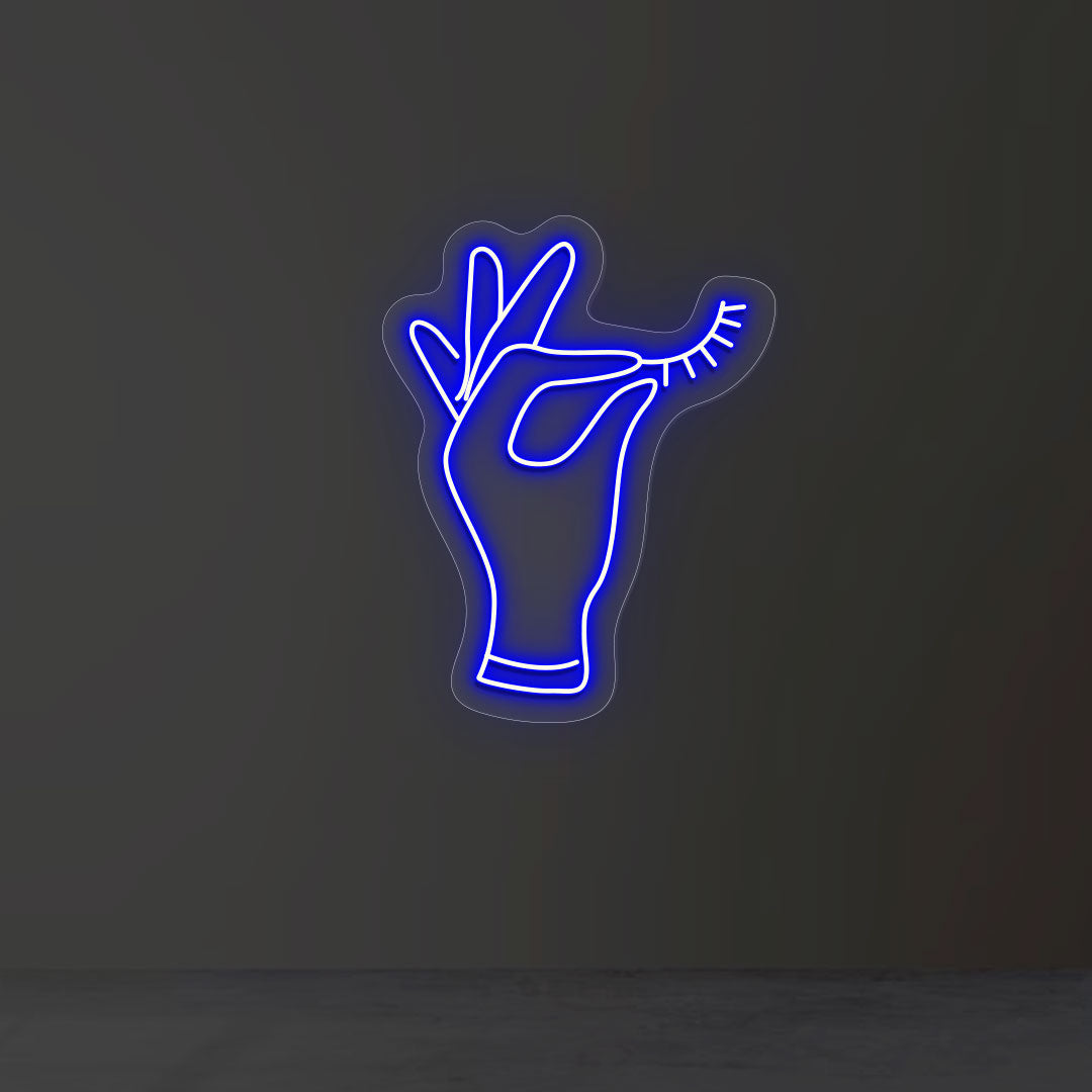 Hand Holding Eyelash Neon Sign