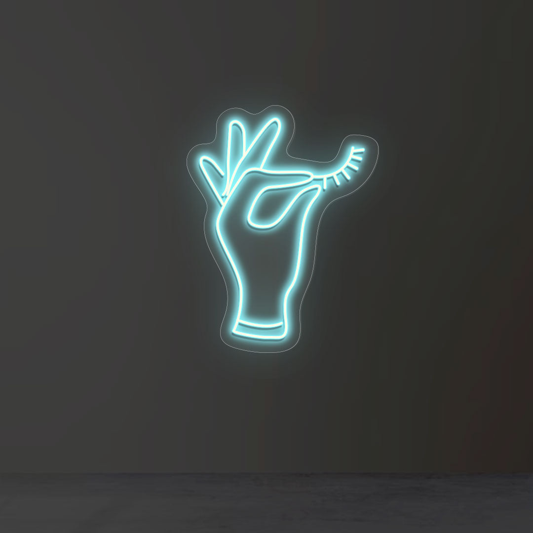 Hand Holding Eyelash Neon Sign